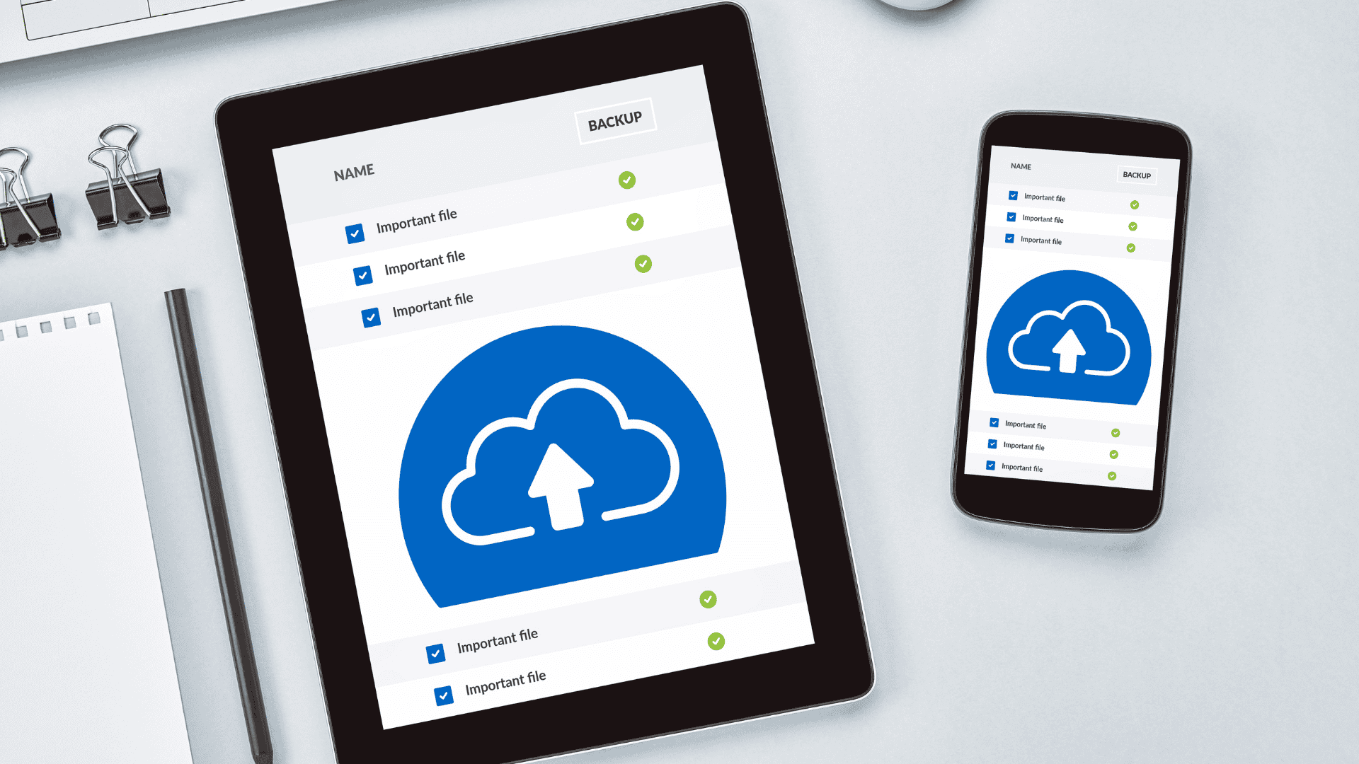 Image of a phone and a tablet both showing the interface of cloud storage.