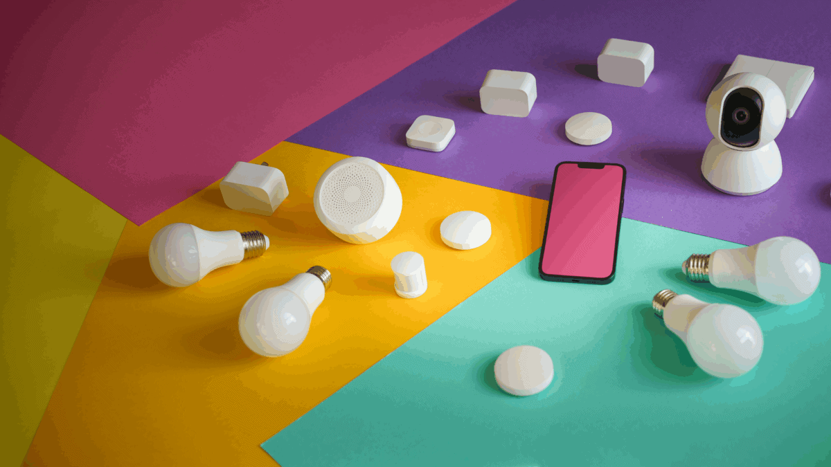 A modern AI security camera sits on a colorful background surrounded by smart home devices, light bulbs, and a smartphone, visually representing the interconnected ecosystem powered by an AI security camera.