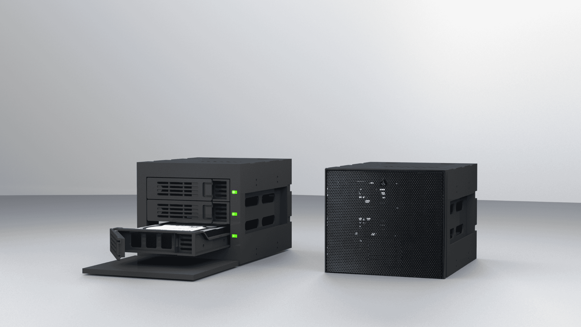 Two sleek, black network-attached storage (NAS) devices are displayed on a minimalist surface, one with a drive tray partially extended, representing options for the best network-attached storage solutions.